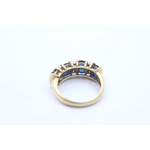 1073 - A 9ct gold diamond and sapphire dress ring - approx. gross weight 3 grams