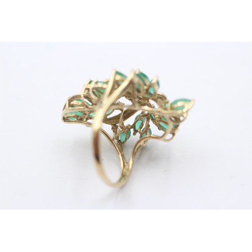 1074 - A 9ct gold diamond and emerald cocktail ring - approx. gross weight 5.3 grams