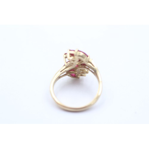 1076 - A 9ct gold ruby dress ring - approx. gross weight 3.2 grams