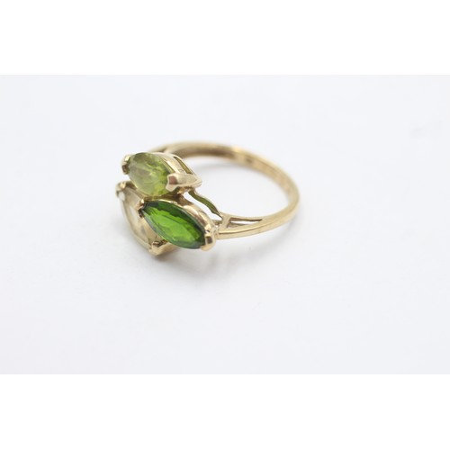 1077 - A 9ct gold diopside, peridot and citrine three stone ring - approx. gross weight 2.8 grams