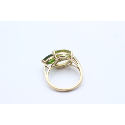 1077 - A 9ct gold diopside, peridot and citrine three stone ring - approx. gross weight 2.8 grams