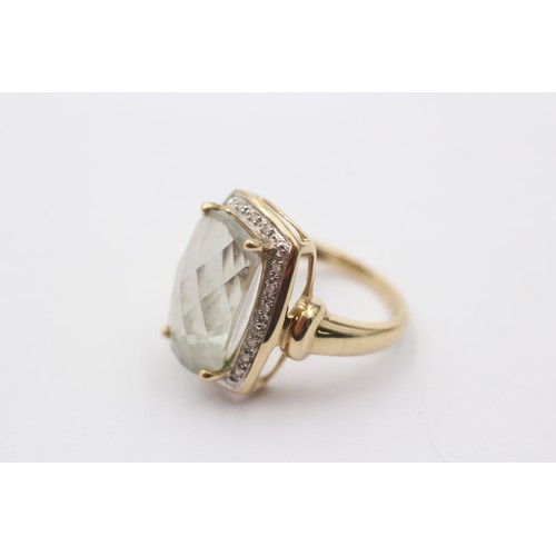 1078 - A 9ct gold green quartz single stone ring with diamond surround - approx. gross weight 5 grams