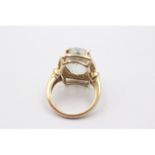 1078 - A 9ct gold green quartz single stone ring with diamond surround - approx. gross weight 5 grams