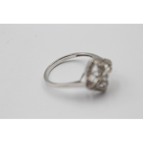 1109 - A 9ct white gold diamond square dress ring - approx. gross weight 2.4 grams