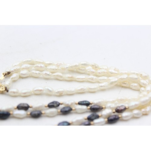 1110 - A cultured rice pearl necklace with 14ct gold clasp and spacers - approx. gross weight 17.1 grams