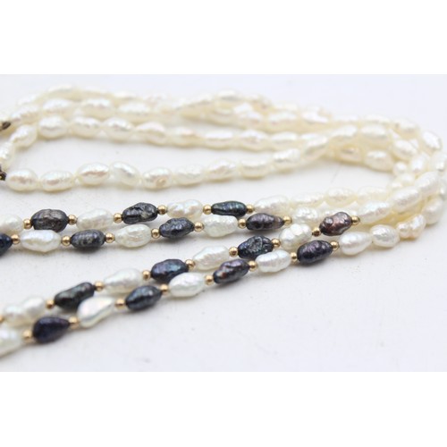 1110 - A cultured rice pearl necklace with 14ct gold clasp and spacers - approx. gross weight 17.1 grams