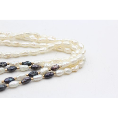 1110 - A cultured rice pearl necklace with 14ct gold clasp and spacers - approx. gross weight 17.1 grams