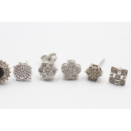 1124 - Six 9ct white gold diamond cluster unpaired single earrings - approx. gross weight 4.1 grams