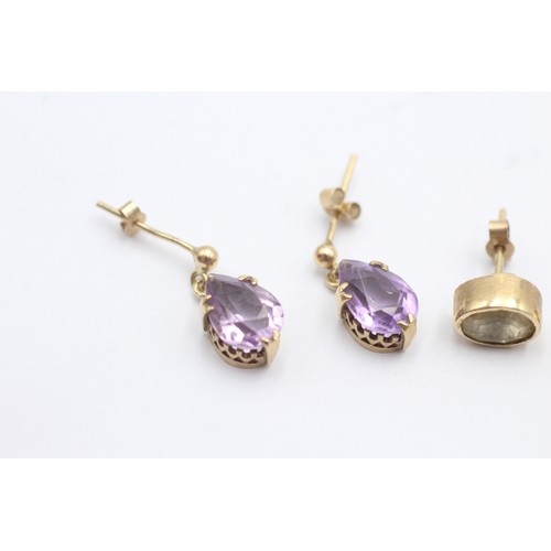 1126 - Two pairs of 9ct gold gemstone earrings, one amethyst and one citrine - approx. gross weight 4.2 gra... 