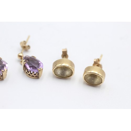 1126 - Two pairs of 9ct gold gemstone earrings, one amethyst and one citrine - approx. gross weight 4.2 gra... 