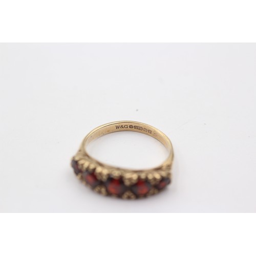 1137 - A 9ct gold garnet five stone ring, size M½ - approx. gross weight 3 grams