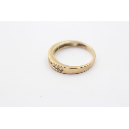 1138 - A 9ct gold diamond half eternity ring - approx. gross weight 2.1 grams