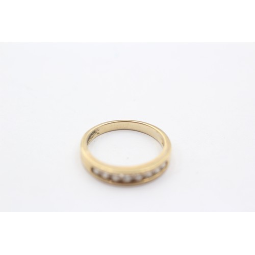 1138 - A 9ct gold diamond half eternity ring - approx. gross weight 2.1 grams