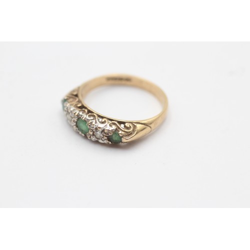 1139 - A 9ct gold diamond and emerald five stone ring - approx. gross weight 2.8 grams