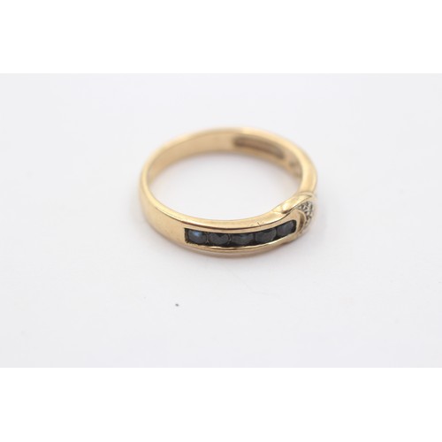 1144 - A 9ct gold diamond and sapphire ring with moon motif - approx. gross weight 2.8 grams