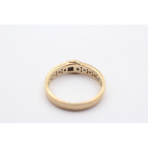 1144 - A 9ct gold diamond and sapphire ring with moon motif - approx. gross weight 2.8 grams