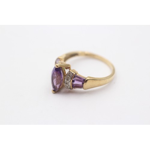 1146 - A 9ct gold diamond and amethyst dress ring - approx. gross weight 2.5 grams