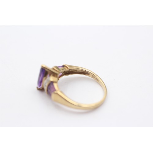 1146 - A 9ct gold diamond and amethyst dress ring - approx. gross weight 2.5 grams