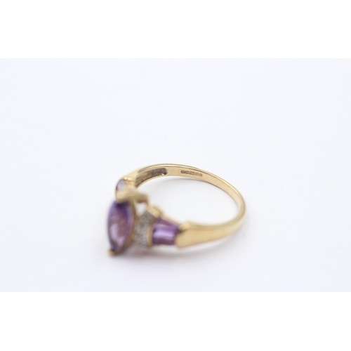 1146 - A 9ct gold diamond and amethyst dress ring - approx. gross weight 2.5 grams