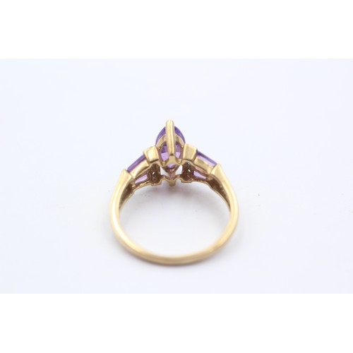 1146 - A 9ct gold diamond and amethyst dress ring - approx. gross weight 2.5 grams