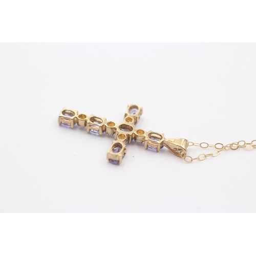 1147 - A 9ct gold diamond and tanzanite cross pendant necklace - approx. gross weight 1.7 grams