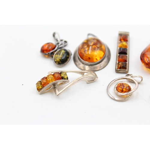 1159 - Eight .925 silver amber set pendants - approx. gross weight 46 grams