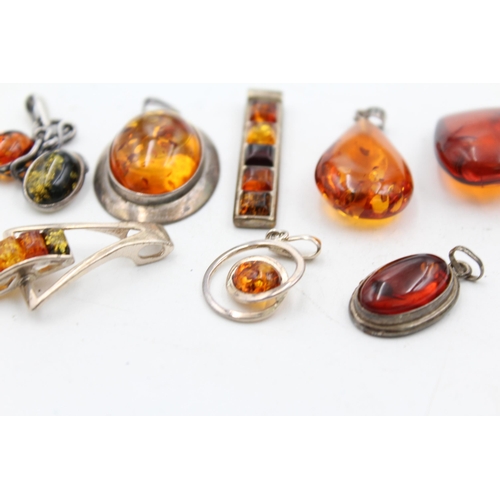 1159 - Eight .925 silver amber set pendants - approx. gross weight 46 grams