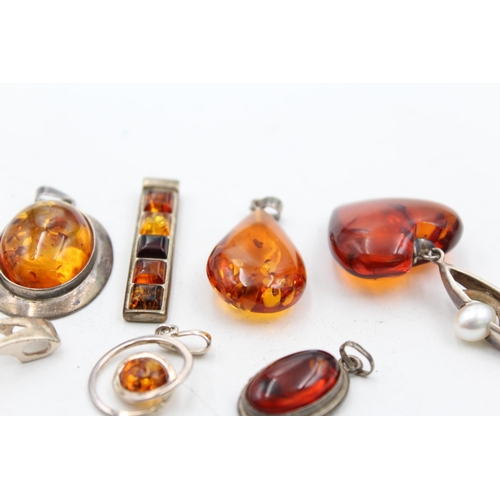 1159 - Eight .925 silver amber set pendants - approx. gross weight 46 grams