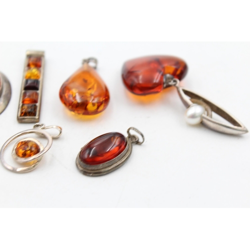 1159 - Eight .925 silver amber set pendants - approx. gross weight 46 grams