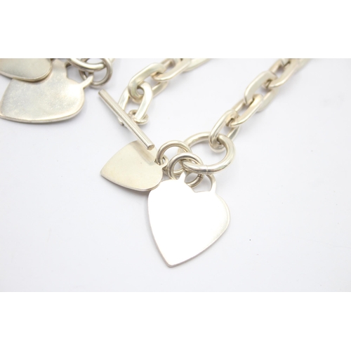 1172 - A .925 silver T bar necklace and bracelet set with heart charms - approx. gross weight 97 grams