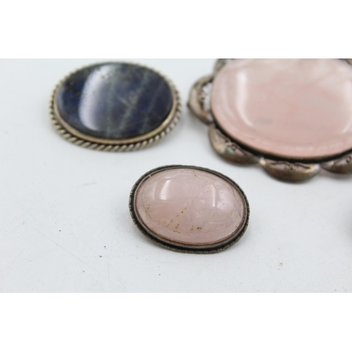 1173 - Four .925 silver gemstone set brooches to include opal - approx. gross weight 58 grams