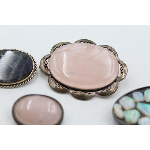 1173 - Four .925 silver gemstone set brooches to include opal - approx. gross weight 58 grams