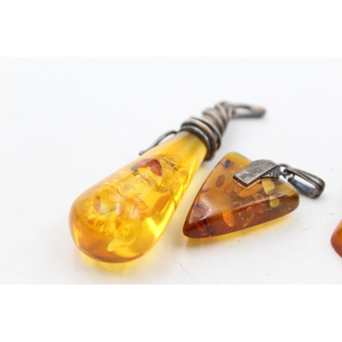 1178 - Six .925 silver amber set pendants - approx. gross weight 28 grams