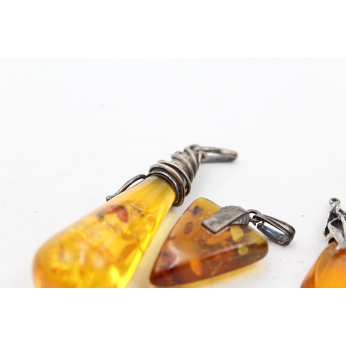 1178 - Six .925 silver amber set pendants - approx. gross weight 28 grams