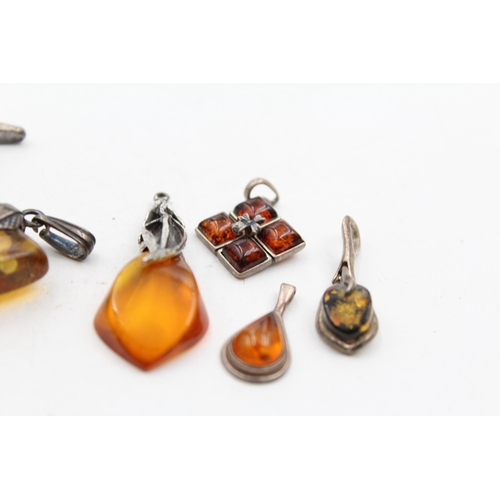 1178 - Six .925 silver amber set pendants - approx. gross weight 28 grams