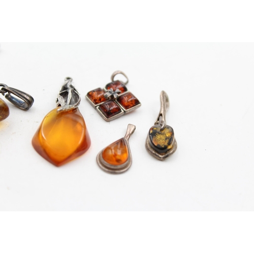 1178 - Six .925 silver amber set pendants - approx. gross weight 28 grams