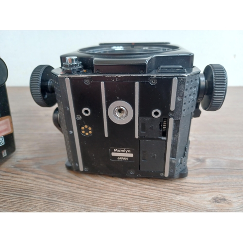 559 - A Mamiya RZ67 Professional medium format camera body fitted with film back and waist level finder