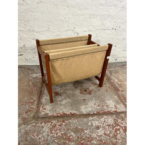 96 - A mid 20th century Danish teak and canvas two section magazine rack