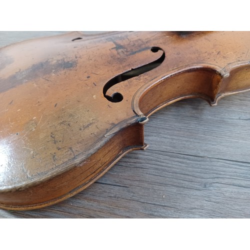 665 - A cased antique violin labelled 'Andreas Guarnerius fecit Cremonæ ſub titulo Sanctæ Teresiæ 16__' wi... 