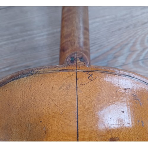 665 - A cased antique violin labelled 'Andreas Guarnerius fecit Cremonæ ſub titulo Sanctæ Teresiæ 16__' wi... 