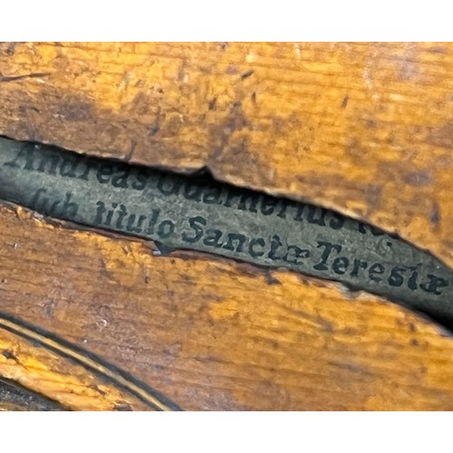 665 - A cased antique violin labelled 'Andreas Guarnerius fecit Cremonæ ſub titulo Sanctæ Teresiæ 16__' wi... 