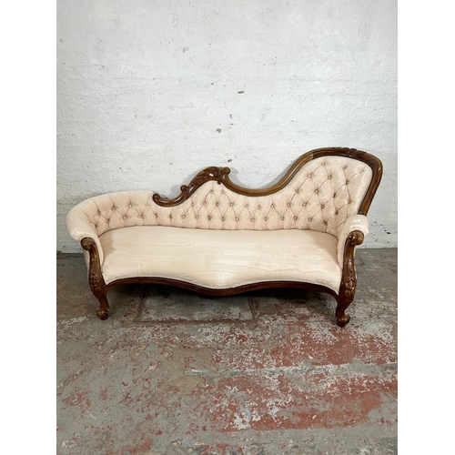 129 - A Victorian style walnut framed and fabric upholstered parlour sofa - approx. 85cm high x 203cm wide... 