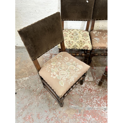 139 - A set of four Cromwellian style oak and fabric upholsterered dining chairs