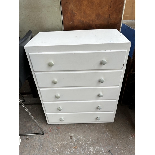 185 - A mid 20th century white painted chest of five drawers