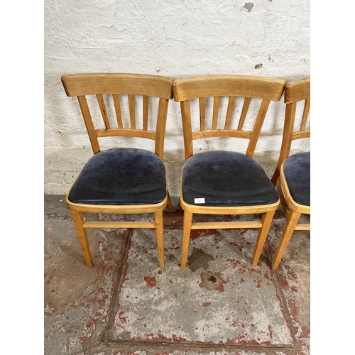 199 - A set of four Habitat beech and blue fabric upholstered dining chairs