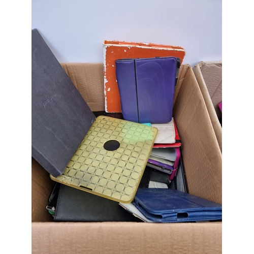 714 - Two boxes containing tablets for spares and repair and various tablet cases and accessories