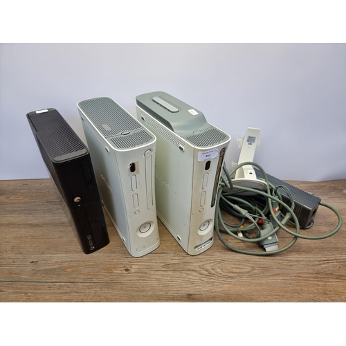 751 - Three Microsoft Xbox 360 games consoles