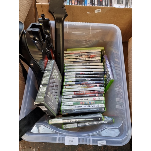 755 - A box containing Xbox 360 games and accessories