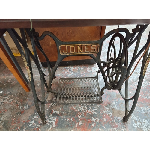 760 - A Jones Medium C.S treadle sewing machine with accessories