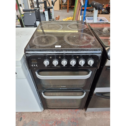 796 - A Hotpoint Ultima HUE53 double oven 50cm electric free standing cooker